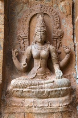 Goddess Sarsvati seated on a lotus, northern niche of the central shrine, Brihadisvara Temple, Gangaikondacholapuram, Tamil Nadu clipart