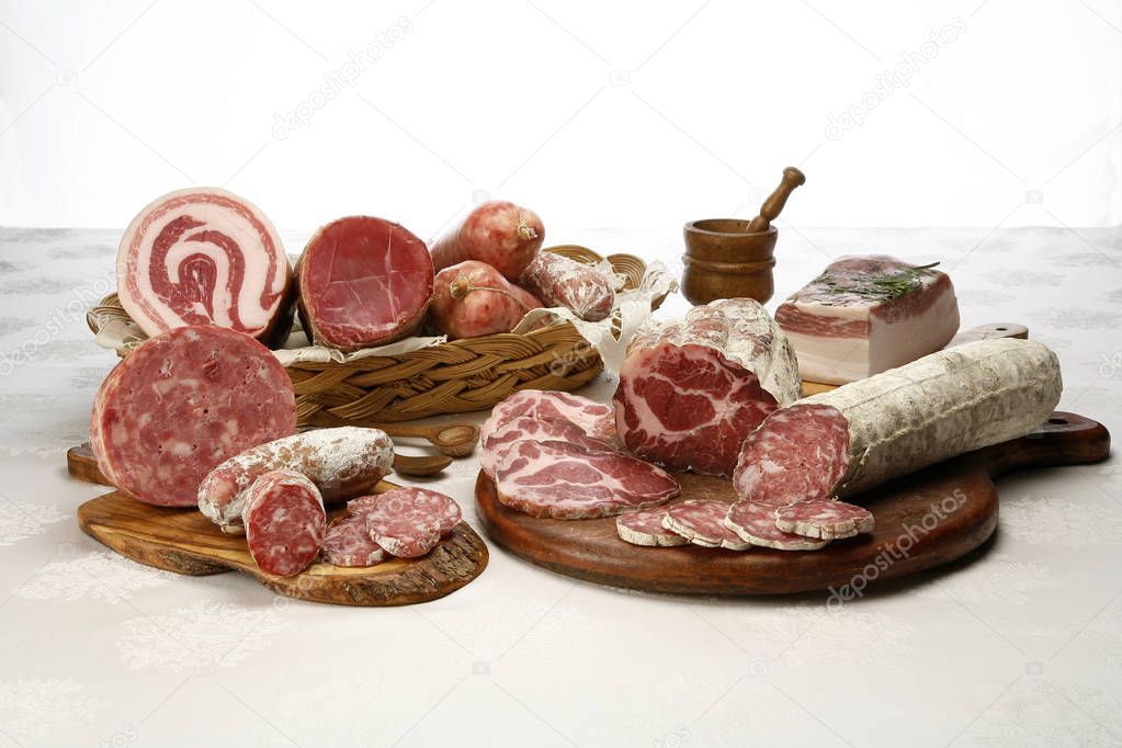 chopping boards with various cold cuts