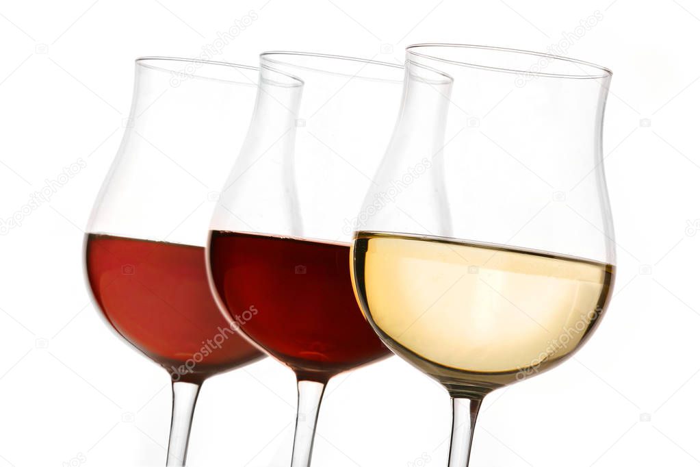 three glasses of white, red and ros wine
