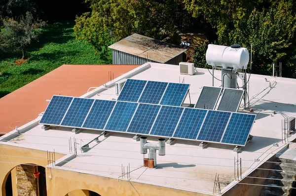 Solar panels on house roof and water heater in Cyprus. Renewable