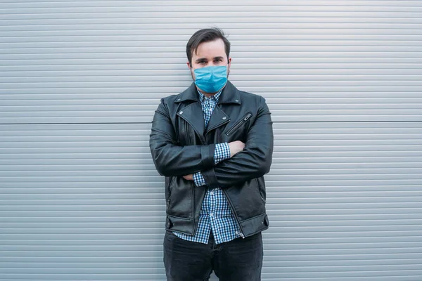 man in medicine mask. Sick man with flu wearing mask, epidemic flu concept on the street, coronavirus, illness, infection, quarantine, medical mask