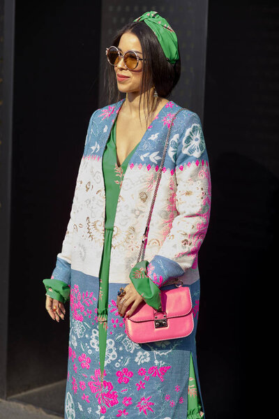 MILAN, ITALY - FEBRUARY 21: A fashionable person is seen outside Gucci during Milan Fashion Week Fall/Winter 2018/19 on February 21, 2018 in Milan, Italy.