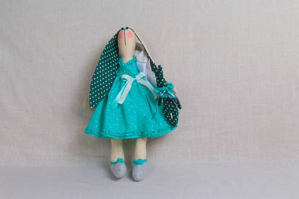 Toy rabbit in green dress, easter — Stock Photo, Image