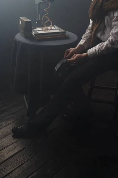 Man looking at his old slides — Stock Photo, Image