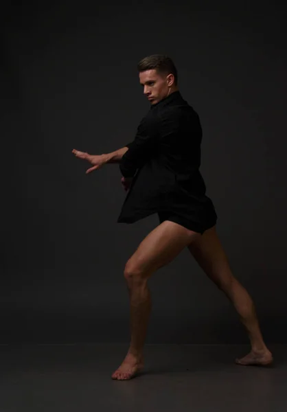 men is dances in a black pants