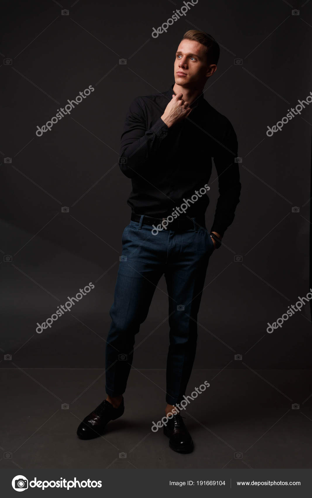 black shirt blue pants