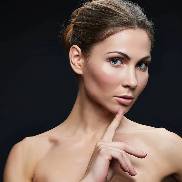 stock image Portrait of blond woman with natural makeup on black background