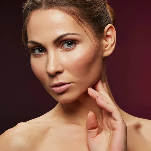 Portrait of blond woman with natural makeup