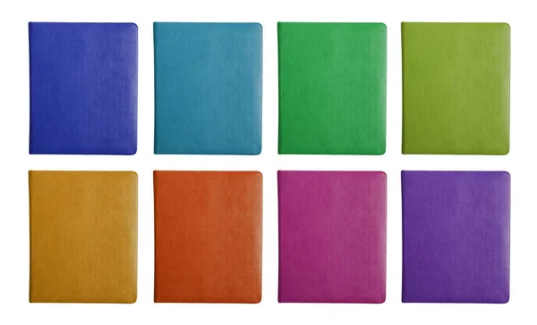 Set of 8 leather notebook covers in various colors isolated on white backgorund