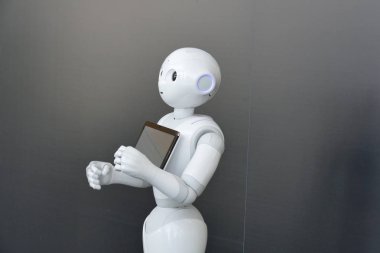Softbank Pepper robot provide assistance in automation fair Turin Italy April 18 2018 clipart