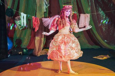 Moscow, Russia, May 16, 2015. A clown woman in the stage image of a stationary doll.