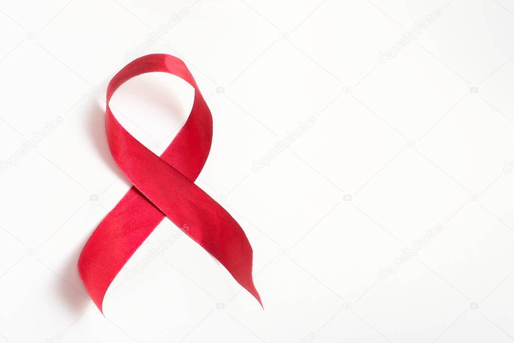 Red ribbon on a white background, December 1 world AIDS day