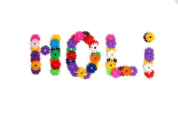 Inscription Holi Lined Multi Colored Plastic Flowers — Stock Photo, Image