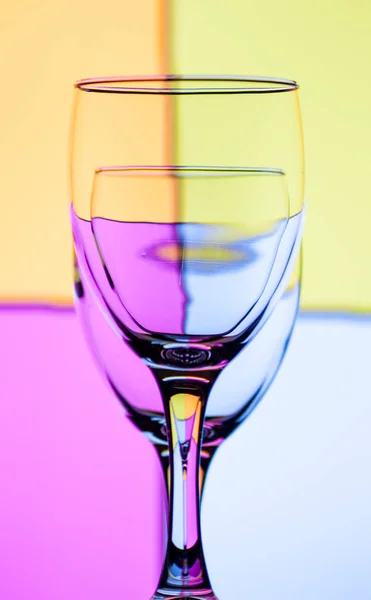 Two Glasses Wine One Another Colored Background — Stock Photo, Image