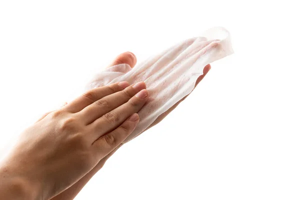 白い背景に湿った布で消毒または手をきれいにするために拭く — ストック写真