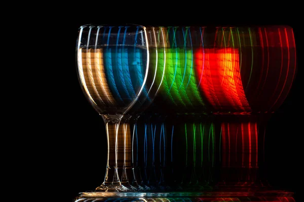 Moving Glass Changing Color Black Background Blur Strobe — Stock Photo, Image