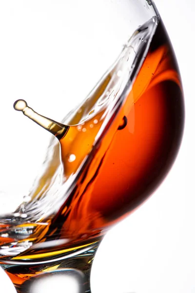 Drop Falling Glass Cognac Whiskey Splash Amazing Angle — Stock Photo, Image