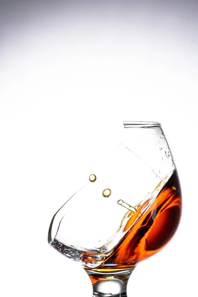 Drop Falling Glass Broken Wall Cognac Whiskey Splash Amazing Angle — Stock Photo, Image