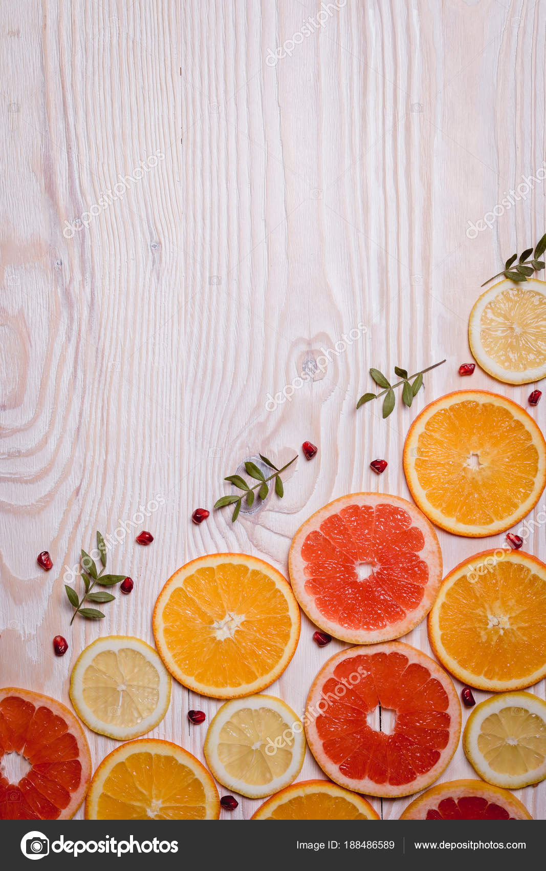 Citrus Fruit Cut In Half Oranges Lemons Tangerines Grapefruit On A Wooden Background Stock Photo C Denysvynnyk