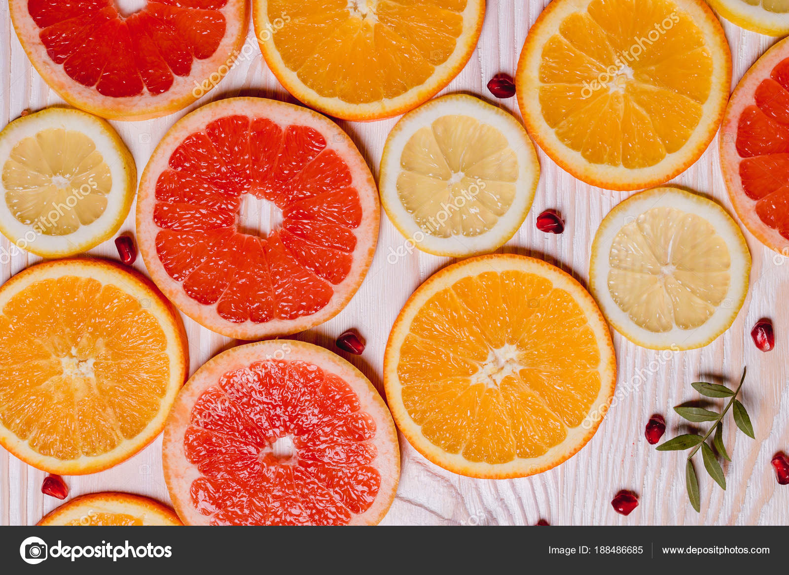 Citrus Fruit Cut In Half Oranges Lemons Tangerines Grapefruit On A Wooden Background Stock Photo C Denysvynnyk