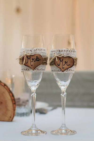 Decorated rustic wedding glasses