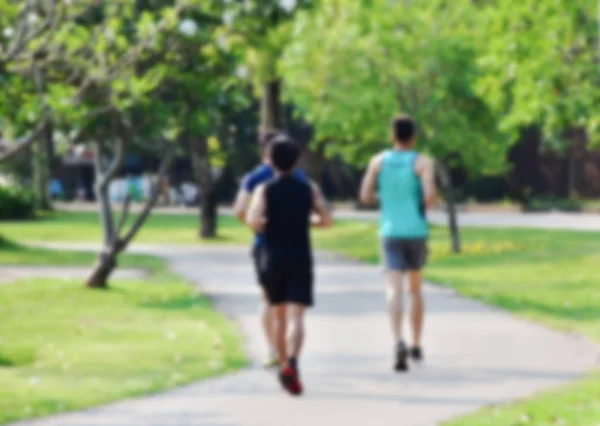 arka insanlar görünümü 3 erkek sabah kamu Park Lane'de çalıştırıyorsunuz. Bulanık bu resim ile uygulanır.