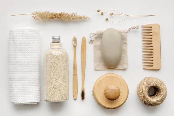 Towel, body scrub, soap, wooden comb, beech toothbrushes, sea bath salt, body brush and other spa objects