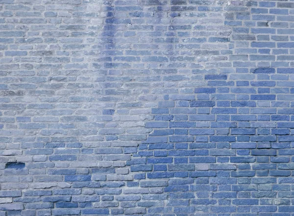 Brick old blue wall. Photo. Texture with bricks.