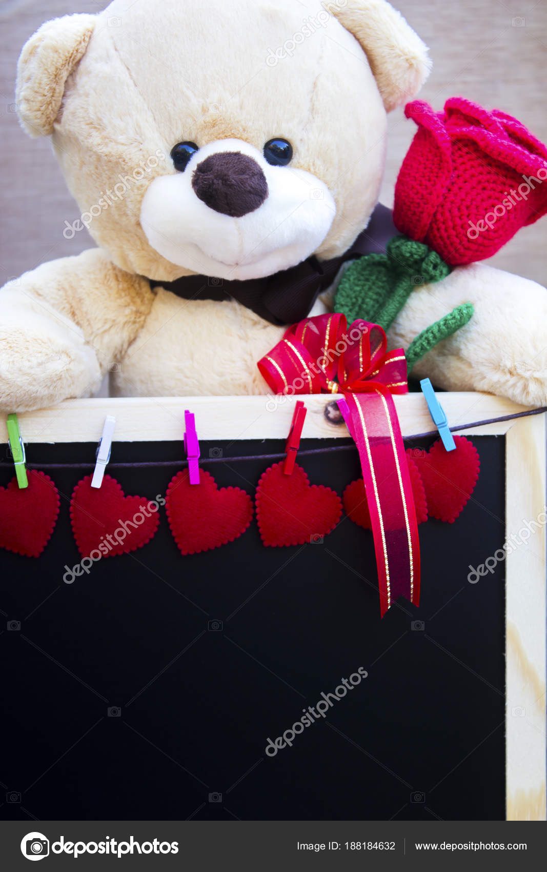 cute teddy bear with red roses