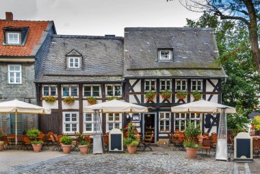 Street with old half-timbered house in Goslar, Germany clipart