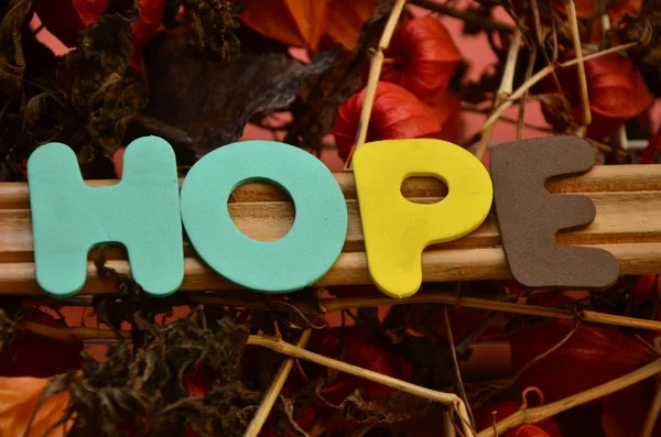 Palavra esperança em um resumo — Fotografia de Stock