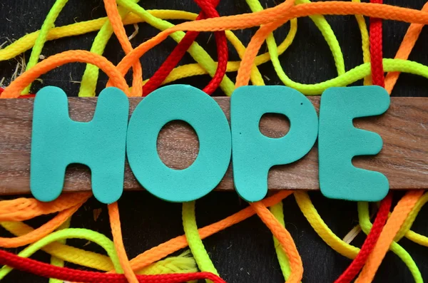 Parola speranza su un astratto — Foto Stock