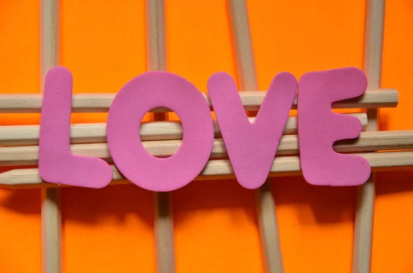 Palavra amor em um abstrato — Fotografia de Stock