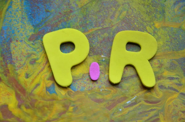 Word pr on abstract — Stock Photo, Image