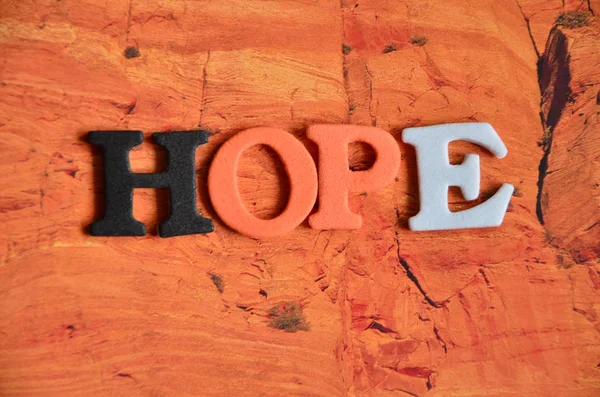 Palavra esperança em um resumo — Fotografia de Stock