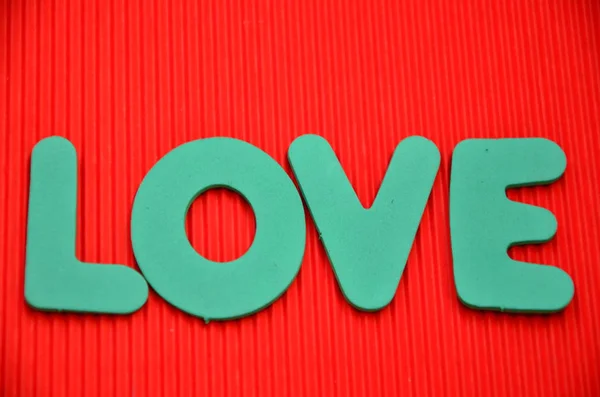 Slovo láska na a resumé — Stock fotografie