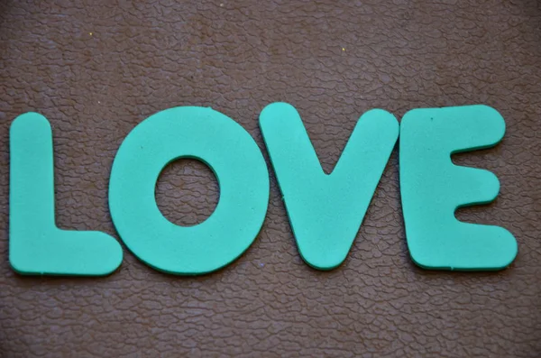 Palavra amor em um abstrato — Fotografia de Stock