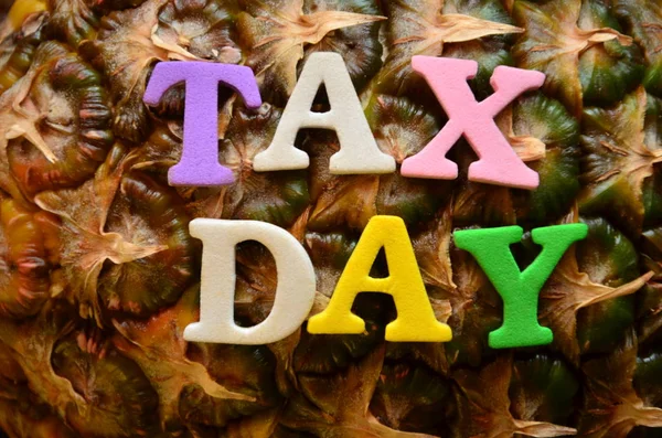 WORD TAX DAY ON A  ABSTRACT — Stock Photo, Image