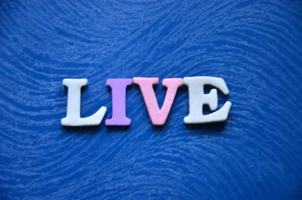 Word live on a  abstract — Stock Photo, Image