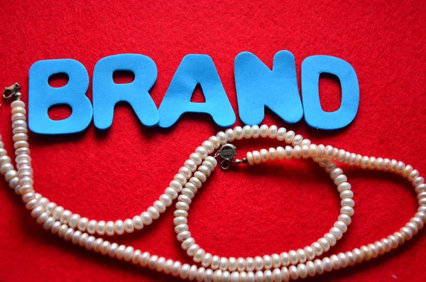 Word brand on a  abstract — Stock Photo, Image