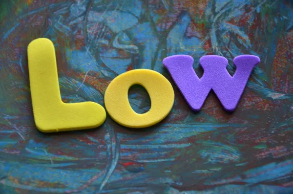 WORD LOW ON A  ABSTRACT — Stock Photo, Image