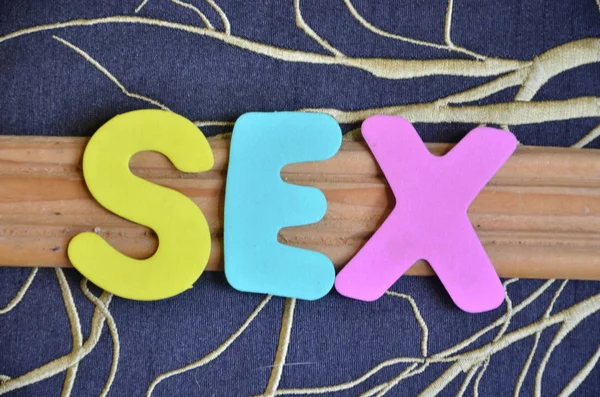 Palavra sexo em um resumo — Fotografia de Stock