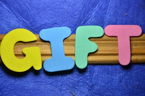 The word gift  on a  abstract — Stock Photo, Image