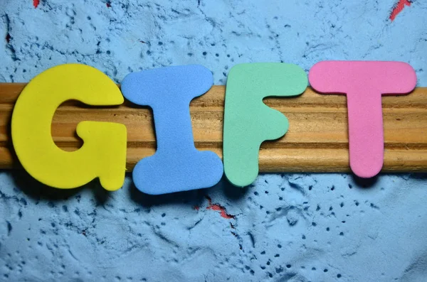 The word gift  on a  abstract — Stock Photo, Image