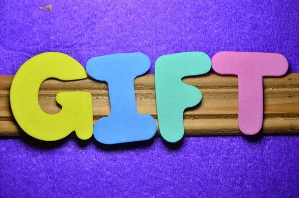 The word gift  on a  abstract — Stock Photo, Image