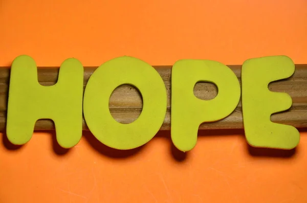 The word hope  ona  abstract — Stock Photo, Image