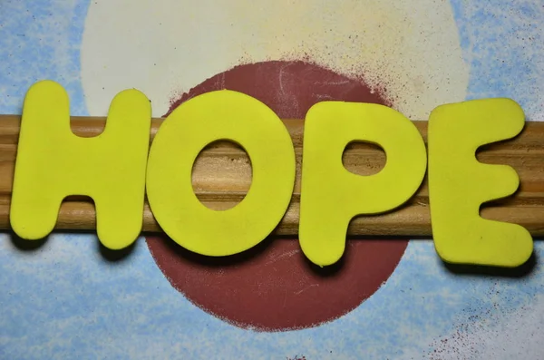 The word hope  ona  abstract — Stock Photo, Image
