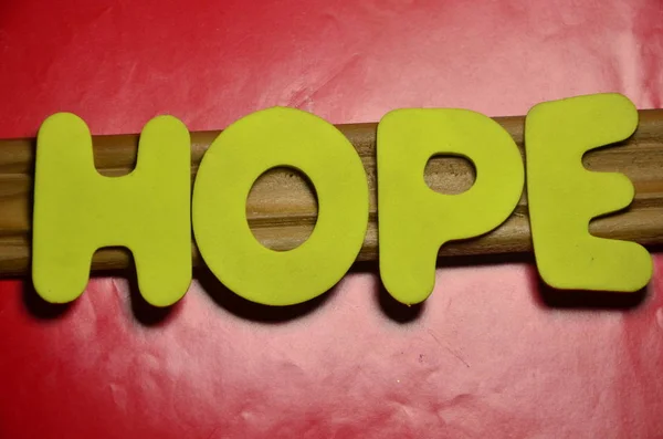 The word hope  ona  abstract — Stock Photo, Image