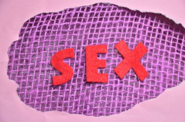 renkli bir arka plan üzerinde kelime seks