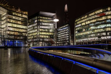 London, UK - Jan 2020: The Shard and The Scoop on a dark wet night